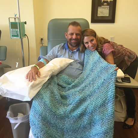 image of a Chemo Companions volunteer with a patient offering encouragement