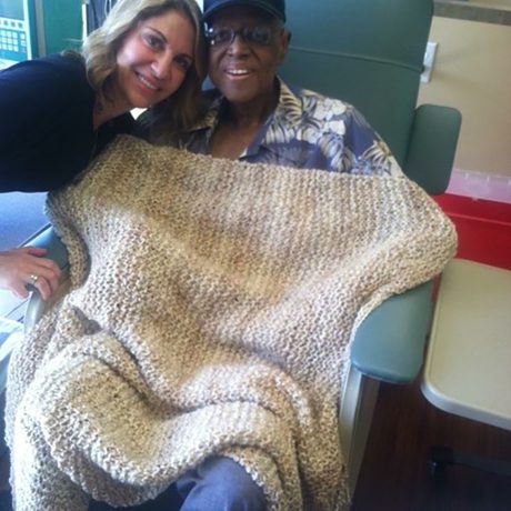 image of a Chemo Companions volunteer with a patient offering encouragement