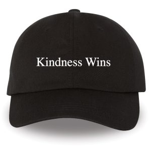baseball cap with the words "Kindness Wins"