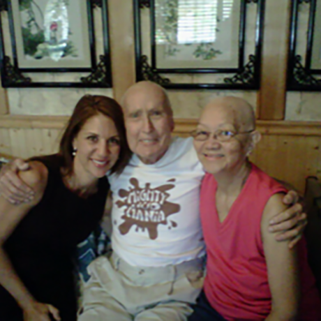 image of a Chemo Companions volunteer with patients offering encouragement