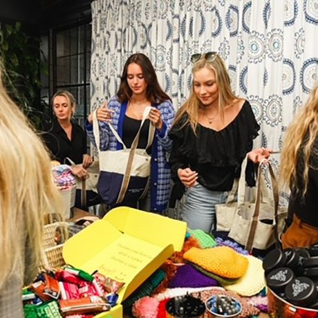 Some Chemo Companions volunteers preparing the bags for the patients.